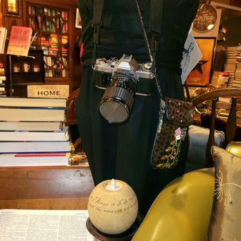 Detroit Vintage - a mannequin with a camera and a book - Coffee & Tea Near Me - Detroit, Michigan