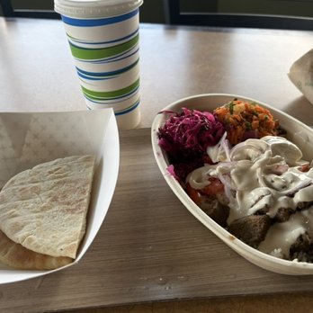 Lemon Tree Mediterranean Grill - very first visit. This is a rice bowl with steak with a side of the Mediterranean, cabbage salad, and the Mediterranean carrot salad. - Mediterranean Near Me - Chesterton, Indiana
