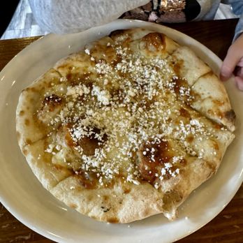 Beachcrest - 4 Cheese Garlic Bread provolone, mozzarella, parmesan, ricotta salata cheeses, roasted garlic on top of house-made sourdough crust. - Beer Bar Near Me - Gleneden Beach, Oregon