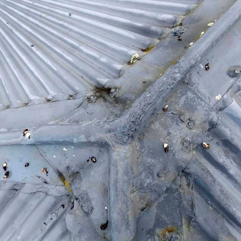 Slide of Liberty City Roofing