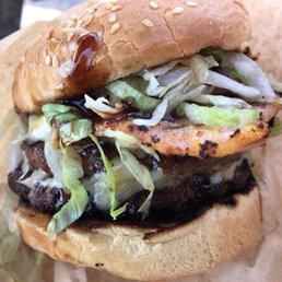 Double Beach Burger - two patties, back bacon, grilled pineapple, mozzarella and special sauce. Also some lettuce and onions etc Double Beach Burger - two patties, back bacon, grilled pineapple, mozzarella and special sauce. Also some lettuce and onions etc