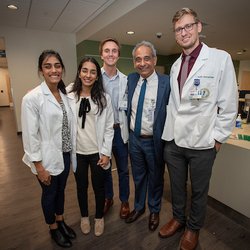 USF Health Eye Institute - Our NEW Chairman, Ramesh Ayyala, MD, with several residents at the Grand Opening.