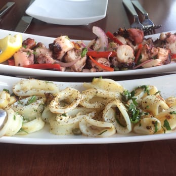 Ouzo Bay - Grilled octopus (a staple, apparently) and grilled calamari. - Greek Near Me - Baltimore, Maryland Ouzo Bay - Grilled octopus (a staple, apparently) and grilled calamari. - Greek Near Me - Baltimore, Maryland