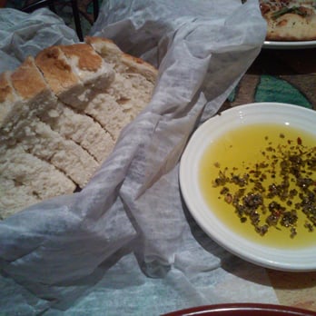 Carrabba's Italian Grill - Fresh bread and olive oil - Seafood Near Me - Independence, Missouri Carrabba's Italian Grill - Fresh bread and olive oil - Seafood Near Me - Independence, Missouri