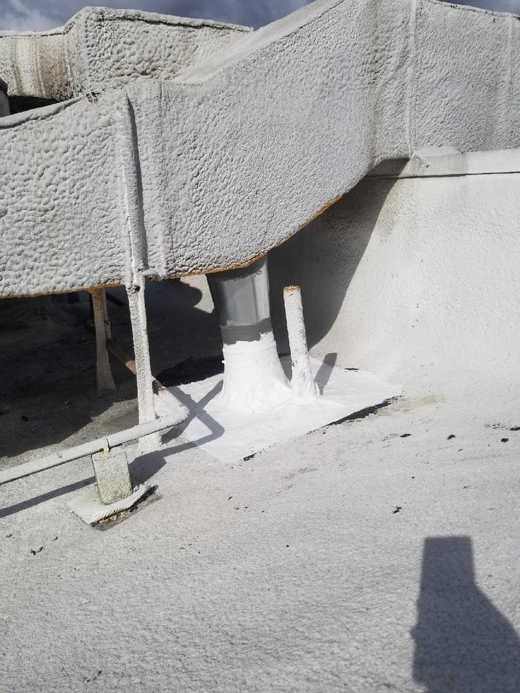 Slide of Huncho Roofer