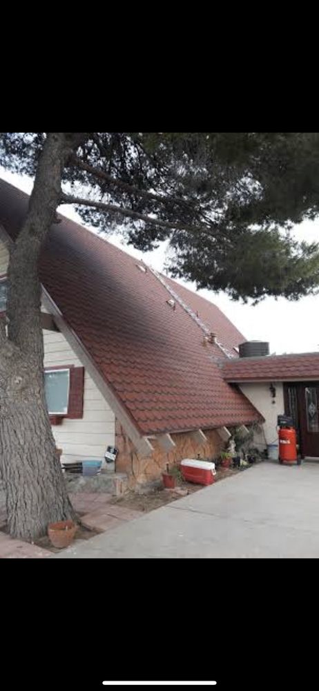 Slide of Mann & Sons Roofing