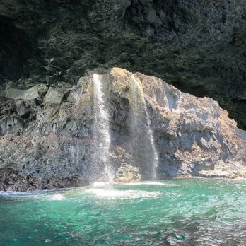 Na Pali Experience - Cave with waterfall= picture time - Boating Near Me - Kekaha, Hawaii Na Pali Experience - Cave with waterfall= picture time - Boating Near Me - Kekaha, Hawaii