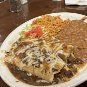 Chuy's - Enchiladas with refried beans and rice - Mexican Near Me - Nashville, Tennessee Chuy's - Enchiladas with refried beans and rice - Mexican Near Me - Nashville, Tennessee