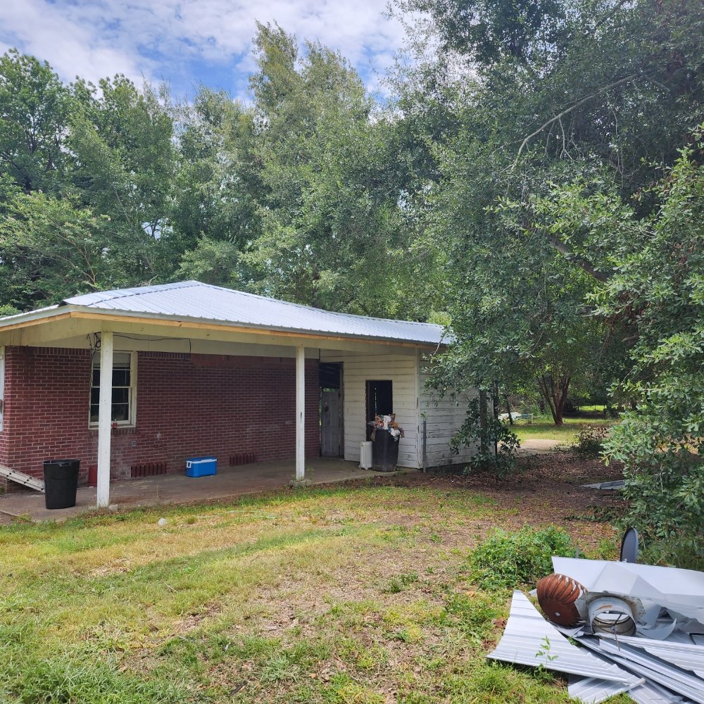 Slide of Flournoy and Sons Roofing