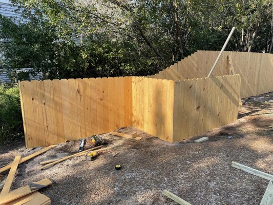 Wood Privacy Fence - There are many different styles of wood privacy fencing that you can choose from. These include:
Shadow box fences
Board-on-board fences
Standard stockade fences
We use two-by-four supports in every fence build, and we can build fences up to 16 feet high. This installation technique lets us use interlocking fencing for proper weight displacement and increased durability. For more information about our wood fence installation services, email us now. Wood Privacy Fence - There are many different styles of wood privacy fencing that you can choose from. These include:
Shadow box fences
Board-on-board fences
Standard stockade fences
We use two-by-four supports in every fence build, and we can build fences up to 16 feet high. This installation technique lets us use interlocking fencing for proper weight displacement and increased durability. For more information about our wood fence installation services, email us now.
