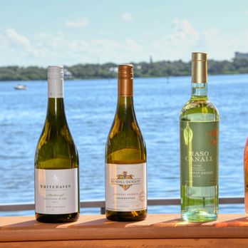 Turtles Restaurant - four bottles of wine on a table - Seafood Near Me - Sarasota, Florida Turtles Restaurant - four bottles of wine on a table - Seafood Near Me - Sarasota, Florida