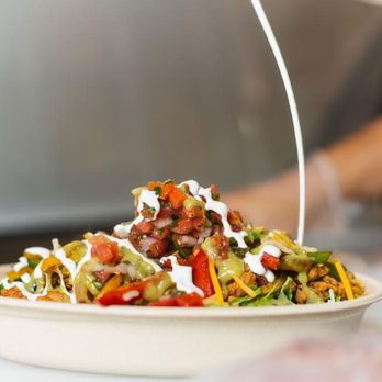 Sombrero Tacoria Clifton - a bowl of salad with dressing - Mexican Near Me - Clifton, New Jersey Sombrero Tacoria Clifton - a bowl of salad with dressing - Mexican Near Me - Clifton, New Jersey