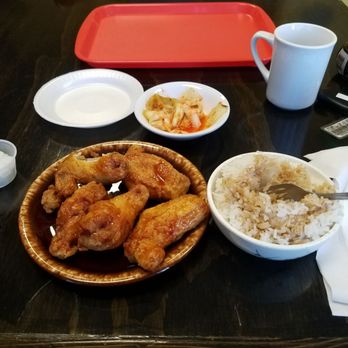Fusion Cafe: Wing It - 6 hot/spicy wings, rice, and kimchi. On a scale from 1-10 their hottest flavor is about a 2-3. Super tasty though. - Korean Near Me - Norman, Oklahoma Fusion Cafe: Wing It - 6 hot/spicy wings, rice, and kimchi. On a scale from 1-10 their hottest flavor is about a 2-3. Super tasty though. - Korean Near Me - Norman, Oklahoma