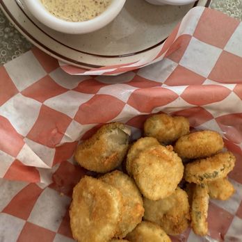 Jerseys Corner - Fried pickles. Ate half the basket before I remembered to take the photo. - Fried pickles served in a basket on checkered paper, accompanied by two dipping sauces in small bowls. - Salad Near Me - Parowan, Utah