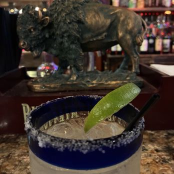 HiFalutin Rapid Western Grill - Cucumber Mint Margarita and Buffalo Trace bulls  while drinking her drink. Hilarious.. - Steakhouses Near Me - Tucson, Arizona