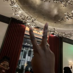 a woman's hand in a restaurant