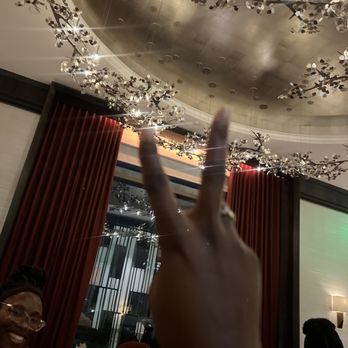 Brassica - a woman's hand in a restaurant - Brasseries Near Me - Atlanta, Georgia