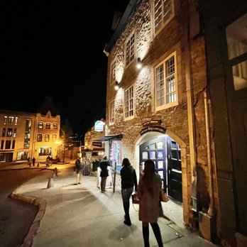 Mary's Popcorn Shop - people walking down the sidewalk at night - Specialty Food Near Me - Quebec City, Quebec Mary's Popcorn Shop - people walking down the sidewalk at night - Specialty Food Near Me - Quebec City, Quebec