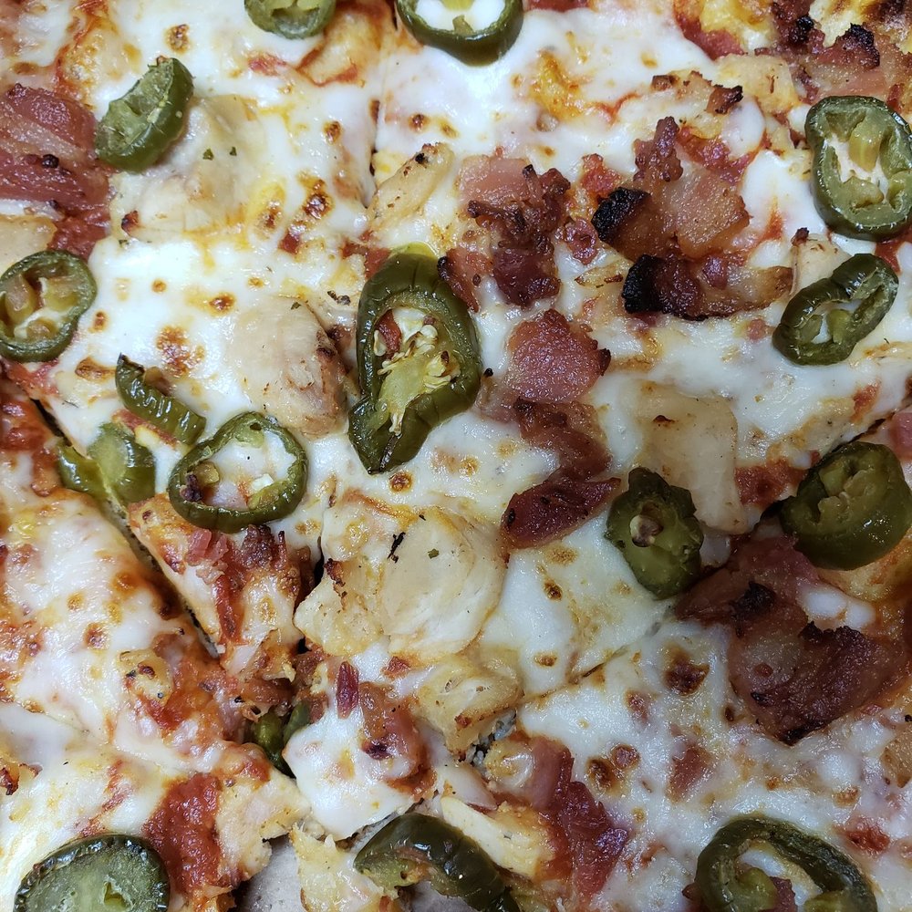Domino's Pizza - a slice of pizza with jalapenos - Pizza Near Me - Mobile, Alabama Domino's Pizza - a slice of pizza with jalapenos - Pizza Near Me - Mobile, Alabama
