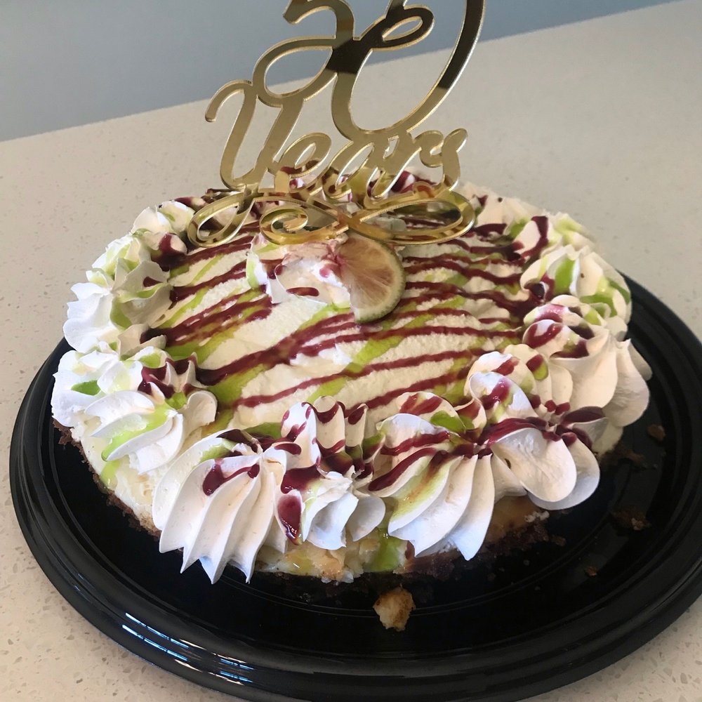 Keylime Bistro - Whole key lime pie (we added the sign) - Seafood Near Me - Captiva, Florida Keylime Bistro - Whole key lime pie (we added the sign) - Seafood Near Me - Captiva, Florida