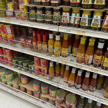 Jumbo Food - a shelf of condiments in a grocery store - International Grocery Near Me - Temple Hills, Maryland Jumbo Food - a shelf of condiments in a grocery store - International Grocery Near Me - Temple Hills, Maryland