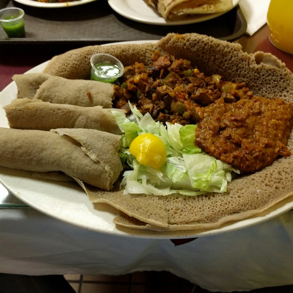Madina Restaurant - Tibi with traditional bread - Ethiopian Near Me - Stone Mountain, Georgia Madina Restaurant - Tibi with traditional bread - Ethiopian Near Me - Stone Mountain, Georgia