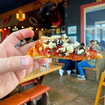Pizza Harbor - Look at that crispy crust and piled toppings! - Pizza Near Me - Seaside, Oregon