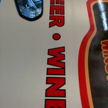 Woody's Beverage Drive Thru - a close up of a sign - Beer, Wine & Spirits Near Me - Columbus, Ohio Woody's Beverage Drive Thru - a close up of a sign - Beer, Wine & Spirits Near Me - Columbus, Ohio