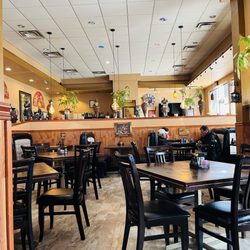 Sang Garden Chinese Restaurant - Eclectic decorations inside!  Seating area main dining room.