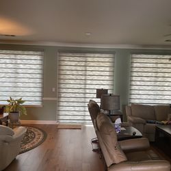 DLUX Window Coverings - Lowered shades.