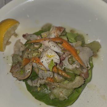Tutta Bella - Insalata Di Frutta Di Mare Scungilli, polpo and shrimp with extra virgin olive oil and lemon - Italian Near Me - Scarsdale, New York Tutta Bella - Insalata Di Frutta Di Mare Scungilli, polpo and shrimp with extra virgin olive oil and lemon - Italian Near Me - Scarsdale, New York