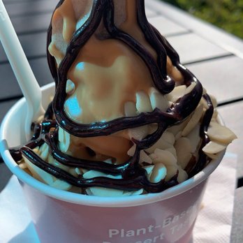 Pressed Juicery - Vanilla Freeze with almond butter, chocolate drizzle, and sliced almonds. - Juice Bars & Smoothies Near Me - Beverly Hills, California Pressed Juicery - Vanilla Freeze with almond butter, chocolate drizzle, and sliced almonds. - Juice Bars & Smoothies Near Me - Beverly Hills, California