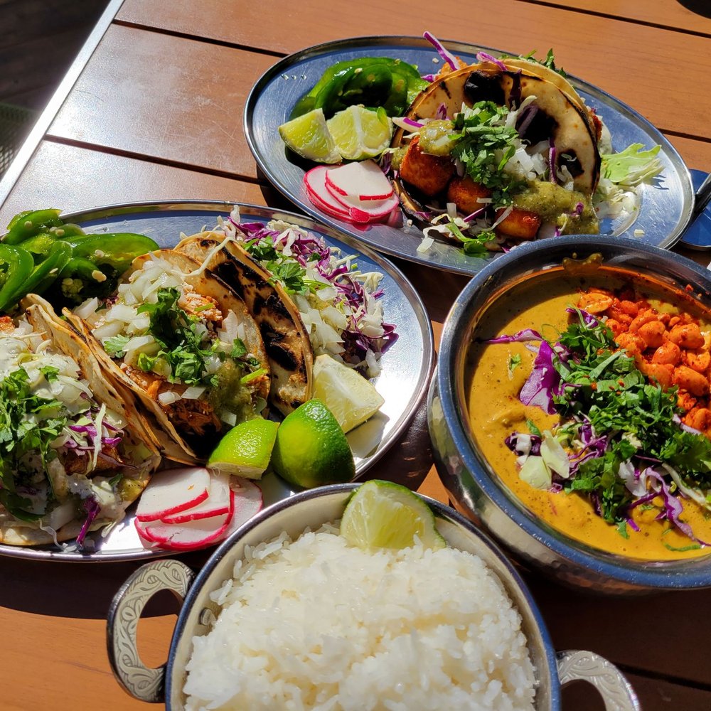 Spork - A selection of tacos and peanut tomato curry with catfish - Mexican Near Me - Bend, Oregon Spork - A selection of tacos and peanut tomato curry with catfish - Mexican Near Me - Bend, Oregon