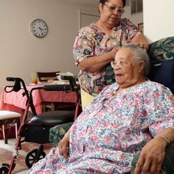 Aging at Home Solution - Taking care an older lady .