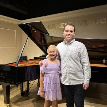 Kyle Hohn Piano - With a student after a recital - Musical Instruments & Teachers Near Me Kyle Hohn Piano - With a student after a recital - Musical Instruments & Teachers Near Me