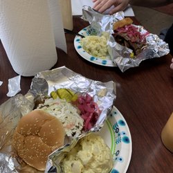 Sliced Pork Deluxe and Sliced Brisket sandwiches with potato salad.