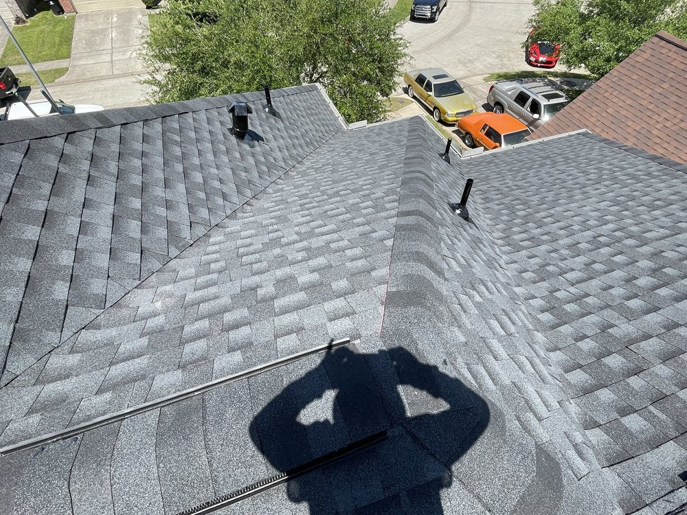 Slide of American Quality Roofers