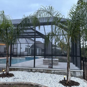 Land Vision Partners - New rock bed with palms, including lighting - exactly what we wanted! - Landscape Architects or Designers Near Me Land Vision Partners - New rock bed with palms, including lighting - exactly what we wanted! - Landscape Architects or Designers Near Me