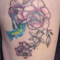 Pale Horse Tattoo & Piercing - My old thigh tattoo looked like two separate pieces. Very blah!