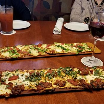 Seasons 52 - Roasted Roma Tomato Flatbread and Prosciutto Flatbread - New American Near Me - Oak Brook, Illinois Seasons 52 - Roasted Roma Tomato Flatbread and Prosciutto Flatbread - New American Near Me - Oak Brook, Illinois