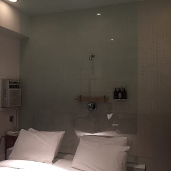 Ace Hotel - bedroom with bathroom and shower - Hotels Near Me - Seattle, Washington Ace Hotel - bedroom with bathroom and shower - Hotels Near Me - Seattle, Washington