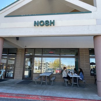 Nosh - people sitting at tables outside a restaurant - Mediterranean Near Me - Park City, Utah Nosh - people sitting at tables outside a restaurant - Mediterranean Near Me - Park City, Utah