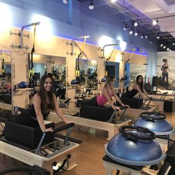 Club Pilates - Try our group class reformers classes! We have great variety of classes, multiple apparatus, best instructors and always a good vibe!