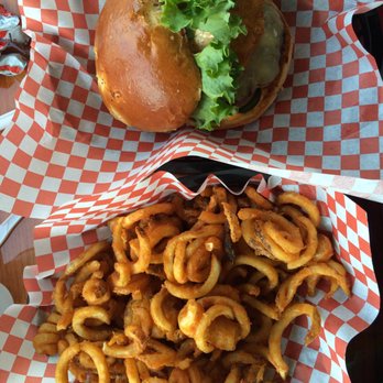 Taystee's Burgers - Jalapeño volcano burger with curly fries basket - Burgers Near Me - Dearborn, Michigan
