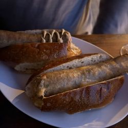 Kansas City Bier Company - Jalapeo Cheddar Bratwurst and Dunkel Bratwurst on pretzel buns (phone did not eat first)