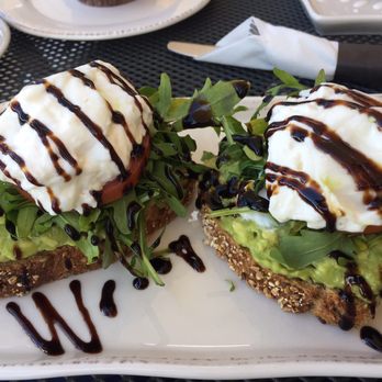 Sheldon's Service Station - Milanese-style avocado toasts (with arugula, tomato, and burrata) - Cafes Near Me - La Mesa, California Sheldon's Service Station - Milanese-style avocado toasts (with arugula, tomato, and burrata) - Cafes Near Me - La Mesa, California