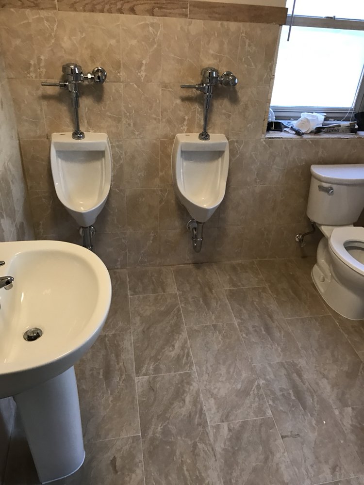 Slide of Lou's Plumbing