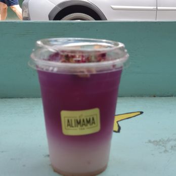 AlimamaTea - Lychee rose. I love the flowers and gold dust on top of drink - Desserts Near Me - New York, New York