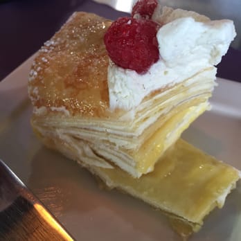 Tiger Lily - Lemon Curd Crepe Cake. Prominent lemon taste but lacks tartness. The crepes have the texture of an undercooked lasagna. - Sandwiches Near Me - Chesterton, Indiana Tiger Lily - Lemon Curd Crepe Cake. Prominent lemon taste but lacks tartness. The crepes have the texture of an undercooked lasagna. - Sandwiches Near Me - Chesterton, Indiana