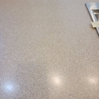 Solid Surface Restorations - This is where the large seam is, where the large cut out was over the dishwasher. - Damage Restoration Near Me - Macomb, Michigan